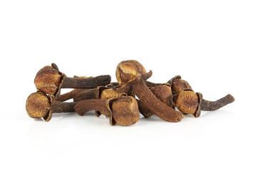 dry cloves on white background