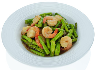 Thai food , Asparagus stir fried with prawns isolated on whiteba