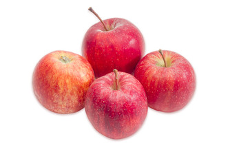 Fototapeta na wymiar Four red apples on a light background
