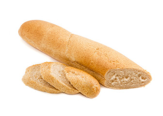 Long wheat bread with bran on a light background