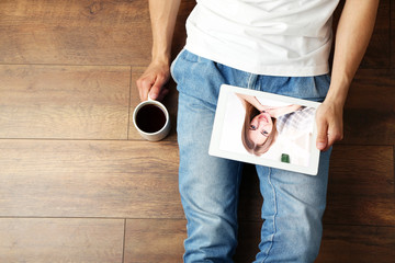 Man having videochat with attractive young woman