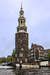 Fototapeta na wymiar Amsterdam church building, canal street, Holland, Netherlands