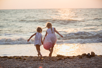 Two little girls on the beach