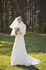 Portrait of a girl in a wedding dress and veil 3938.