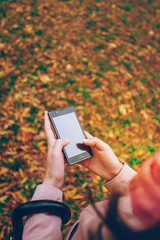 Young woman text messaging