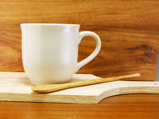studio shot of coffee beans on wooden background still life