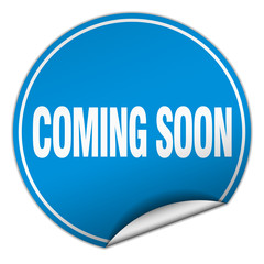 coming soon round blue sticker isolated on white