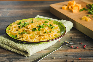Pasta with pumpkin, herbs and pepper.
