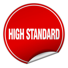 high standard round red sticker isolated on white