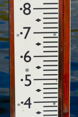 Water depth marker in river