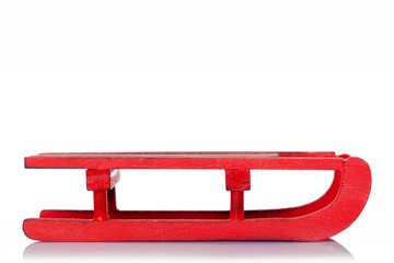 Red sled isolated over white background