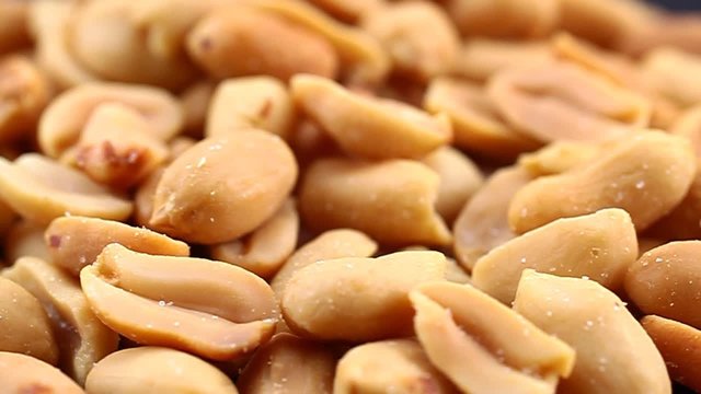Close up of roasted and salted peanuts