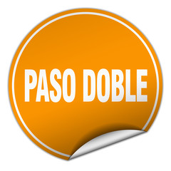 paso doble round orange sticker isolated on white