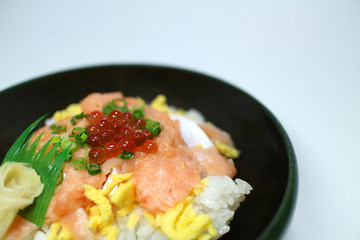 raw salmon rice bowl close up #2