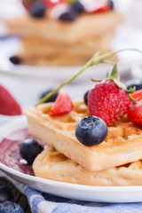 Waffles with strawberries and blueberries  for Breakfast,Belgian.selective focus