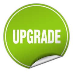 upgrade round green sticker isolated on white