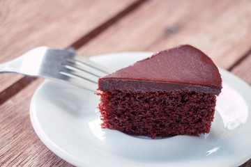 chocolate cake put on dish (Blue style in dark)