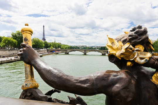 View on Seine River and Eiffel Tower from Alexander III bridge (