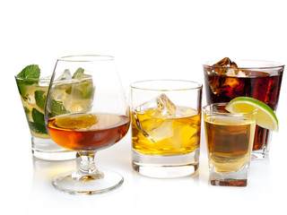 Various cocktails, drinks and shots over white background