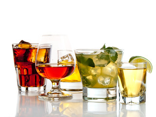 Various cocktails, drinks and shots over white background