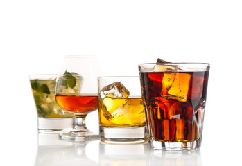 Various cocktails, drinks and shots over white background