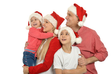 Fototapeta premium family wearing Christmas holiday caps