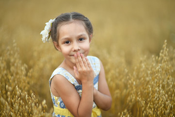 Little  girl in wheat field