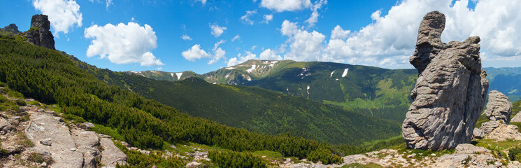  Stony figure on mountain ridge