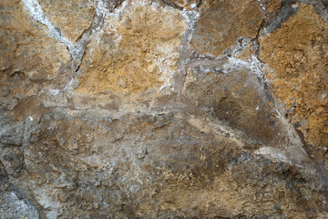 Old stone pavement or wall as a background, top view, horizontal