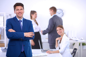 Business people sitting and discussing at business meeting