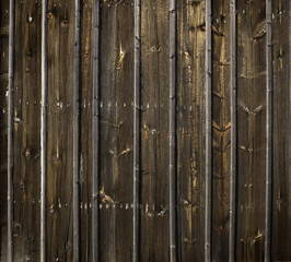 rustic weathered barn wood background with knots and nail holes