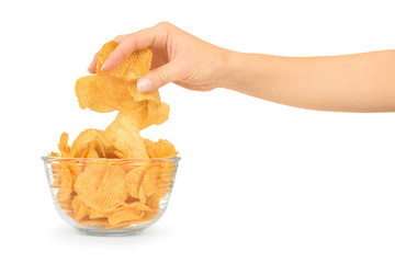 Hand with potato chips and bowl on white background