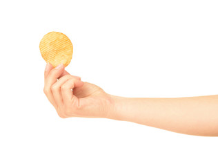 Hand holds potato chips. Isolated on a white background.
