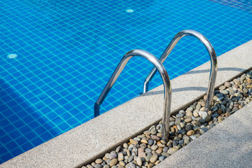 Obraz premium Swimming pool with stair at hotel