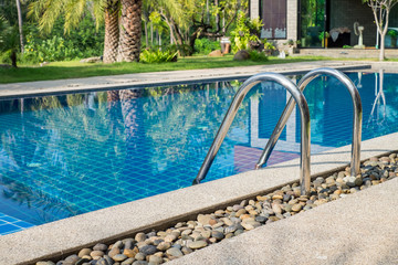 Swimming pool with stair at hotel