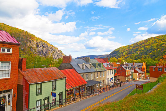 Harpers Ferry historic town in autumn and Blue Ridge Mountains. Houses on the street of historic town in Harpers Ferry National Historical Park, West Virginia, USA.