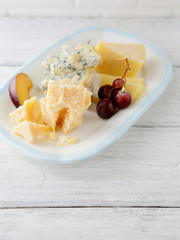 pieces of cheeses on plate