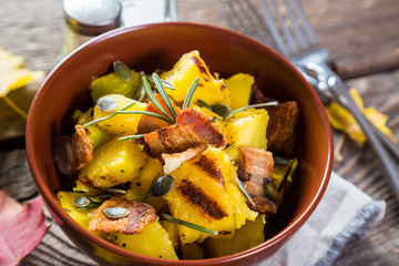 Pumpkin with bacon and rosemary