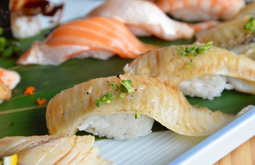 Fish fin sushi (Engawa sushi) in sushi set, traditional Japanese food.

