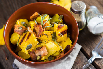 Pumpkin with bacon and rosemary