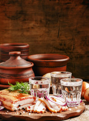 Vodka with spicy red onion, bacon and pepper, Russian tradition,