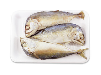 Mackerels steamed in a pack on white background