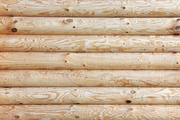 Wall from logs.  Background. Wooden texture.