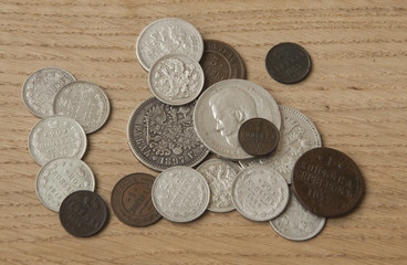 The old silver and copper coins Russia, on a wooden background