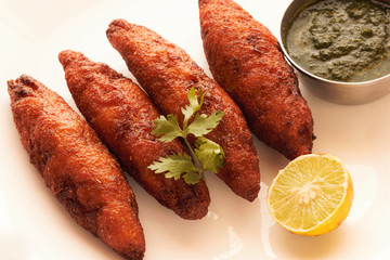 deep fried bread rolls with stuffed potatoes

