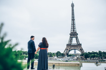 Bride and groom having a romantic moment on their wedding day in Paris