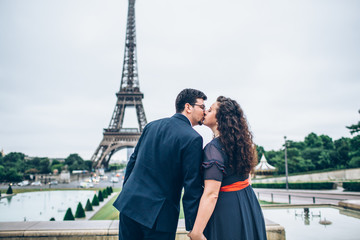 Bride and groom having a romantic moment on their wedding day in Paris