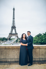 Fototapeta na wymiar Bride and groom having a romantic moment on their wedding day in Paris