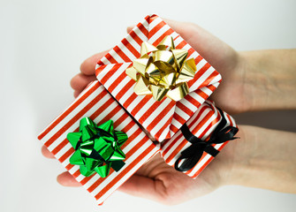 Christmas presents in hands isolated