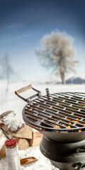 Empty BBQ grill with hot coals in winter
